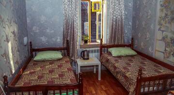 Фото номера Семейный номер с общей ванной комнатой Хостел Guest House on Arbatskaya г. Коломна 5